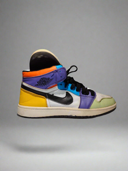 Colorful sneaker with a brand logo on a gray background