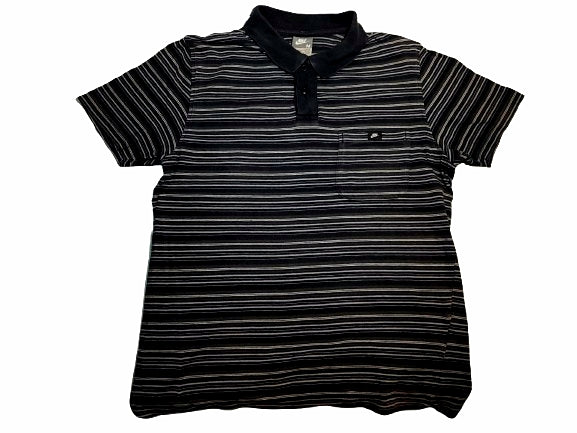 Black and white striped polo shirt on a white background